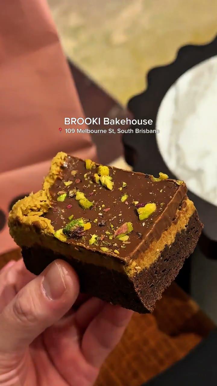 Brooki Fish Lane reel: the new bakehouse, its cake cabinet and a pistachio brownie.